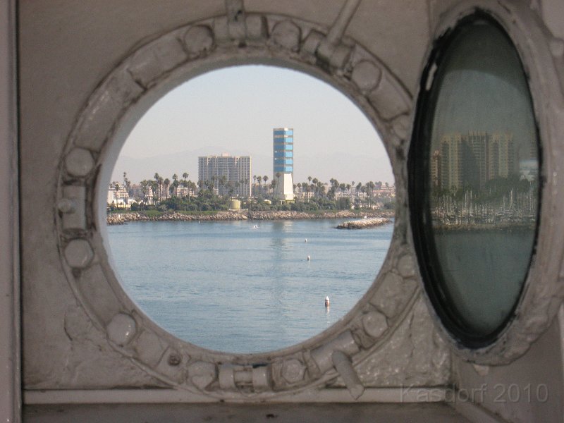 Queen Mary 2010 0220.JPG - A view of LA from a Queen Mary porthole.